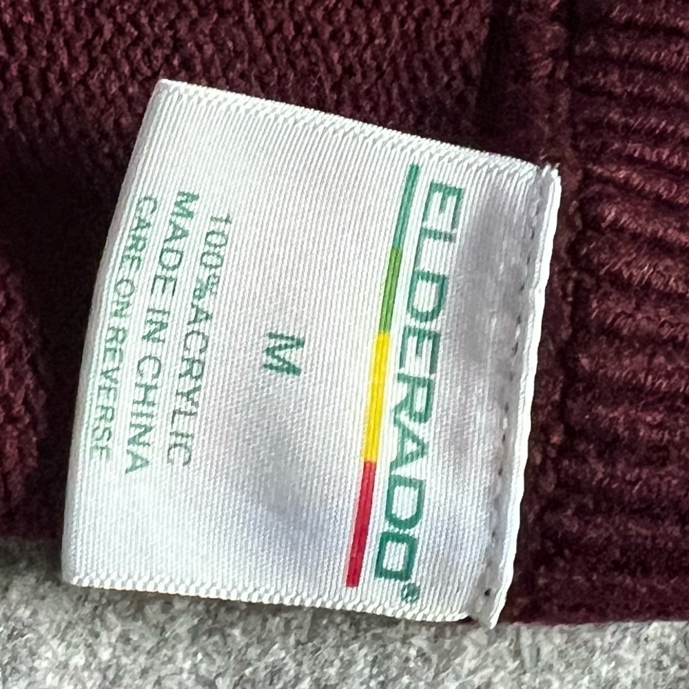 Leap Academy charter school burgundy vest